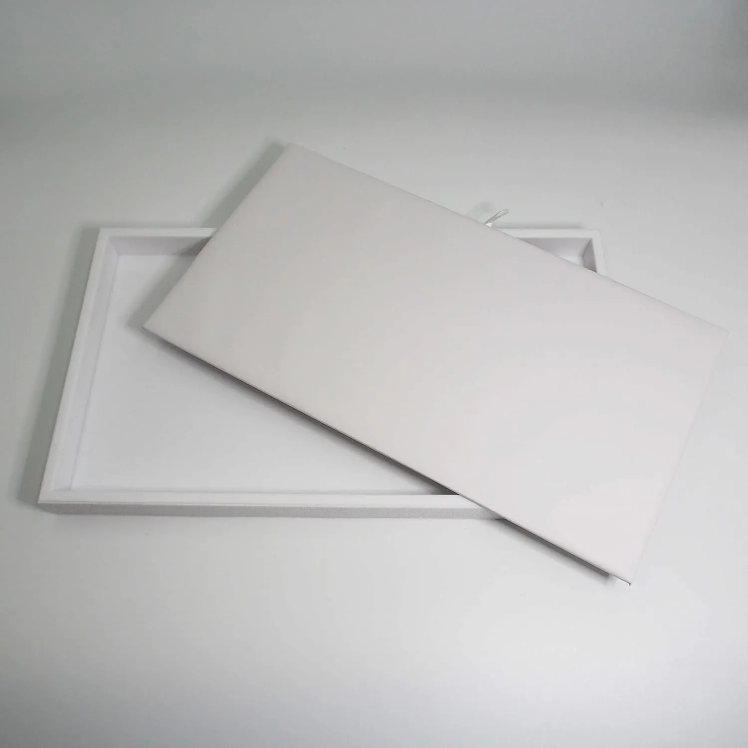 888 Display White leatherette Jewelry Pads Jewelry Organizer can be used with any standard size trays. Ideal to use for organizing jewelry at a store or just at home.