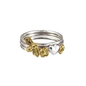 Stacking Rings with Gold Celtic Symbols